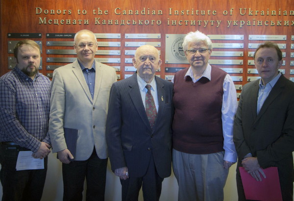 Image -- Peter Savaryn (center), founder of the Petro and Olya Savaryn Fund at CFUS, being recognized with an award by the CIUS in 2014.