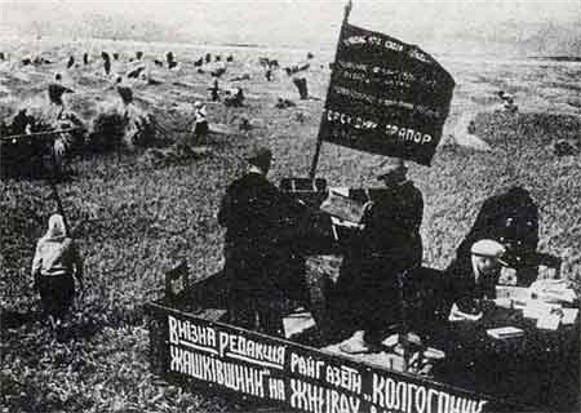 A rural newspaper staff reports on the work at a collective farm in Ukraine.