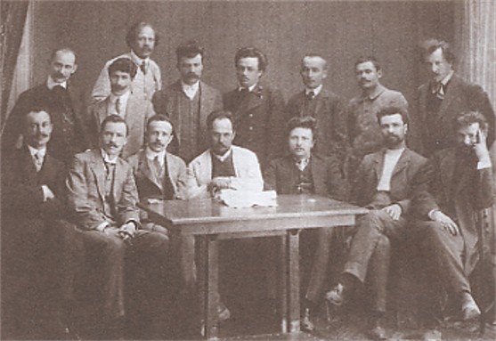 Image -- Rada editorial board, 1910; sitting: O. Kuzmynsky, S. Cherkasenko, L. Pakharevsky, Ye. Chykalenko, H. Sherstiuk, S. Yefremov, F. Matushevsky; standing: M. Hekhter, P. Poniatenko, M. Vorony, M. Pavlovsky, P. Hai, P. Sabaldyr, S. Vasylchenko, O. Oles.