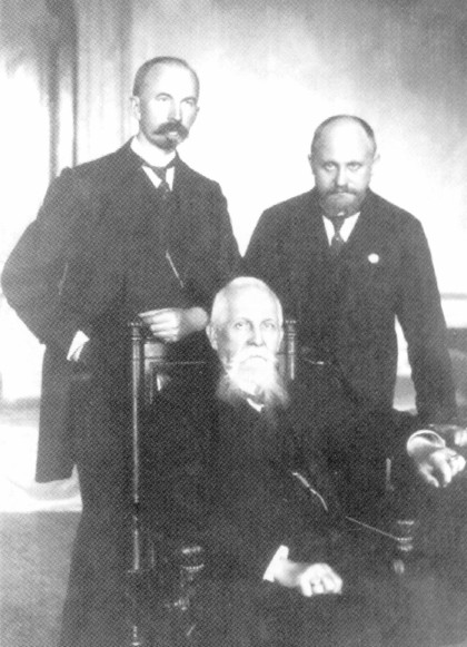 Image -- Yulii Romanchuk (sitting), Lev Levytsky, and Oleksander Kolessa.