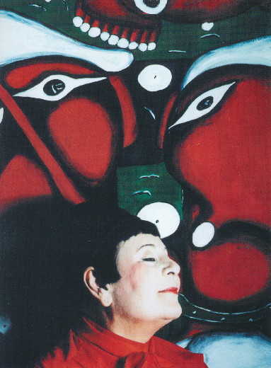 Image - Emma Andiievska and her painting.
