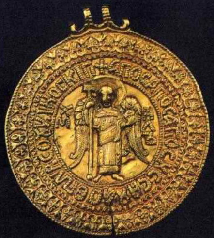 Image -- The gold Chernihiv zmiiovyk medallion (presumably belonging to Prince Volodymyr Monomakh) with the depiction of Archangel Michael.