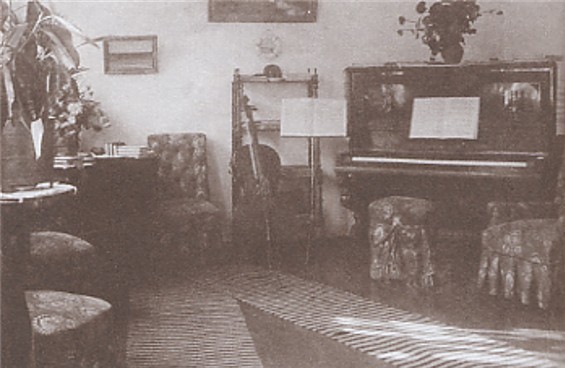 Image -- The living room in the Chykalenkos' house in Kononivka.
