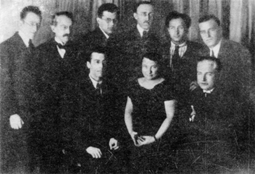 Image -- Oles Dosvitnii (standing, far right) among Ukrainian and Czech writers in Prague, 1925.