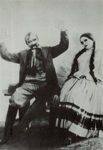 Image - Yosyp Hirniak and Valentyna Chystiakova in Les Kurbas' production of M. Kulish's Peoples Malakhii in Berezil (1928).