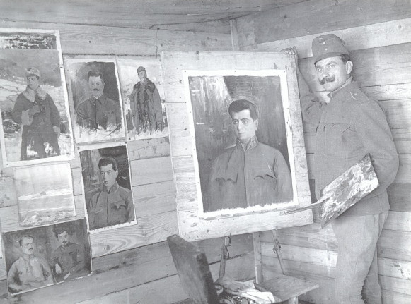 Image - Osyp Kurylas with his paintings.