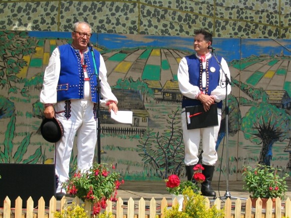 Image - Men in Lemko folk costumes during a folk performance.