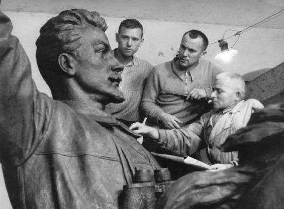 Image -- Mykhailo Lysenko working on the Mykola Shchors monument.