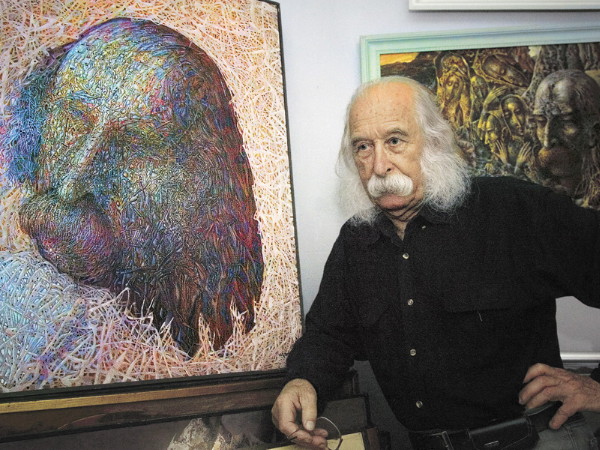 Image - Ivan Marchuk with his paintings.