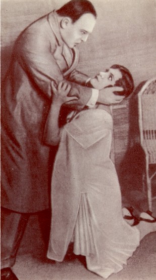 Image -- Ivan Marianenko and Nataliia Uzhvii in Berezil's production of Somerset Maugham and John Colton's Sedi (1926).