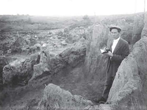 Image -- Teodosii Molchanivsky at Raiky fortified settlement excavations (1930s).