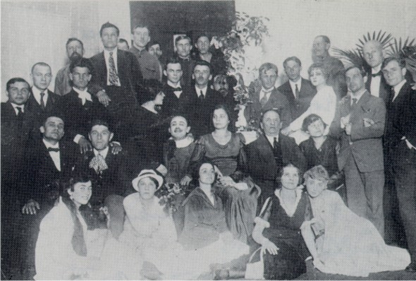 Image -- Molodyi Teatr actors and technical staff after the end of its first season 1917-1918.