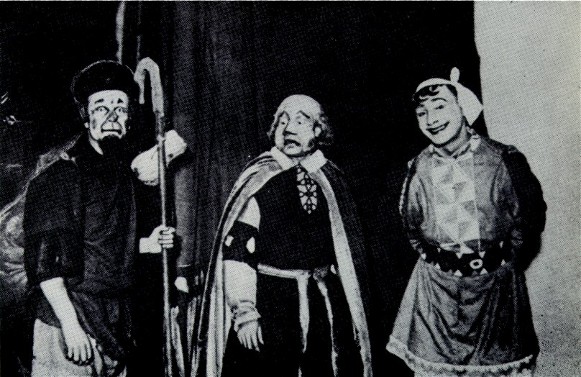 Image -- P. Dolyna, O. Yursky, and Les Kurbas in Kurbas's production of F. Grillparzer's Weh dem, der lugt! in Molodyi Teatr (1918).