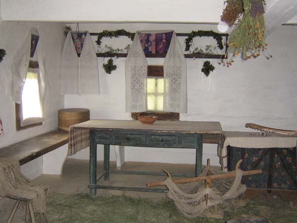 The National Museum of Folk Architecture and Folkways of Ukraine (Kyiv): an interior of a fishermans house. Image - The National Museum of Folk Architecture and Folkways of Ukraine (Kyiv): an interior of a fishermans house.
