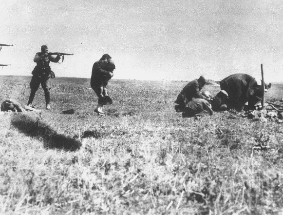 Image - Nazi soldiers killing Jews in Podilia region (1942).