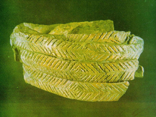 Image - A Paleolithic bracelet excavated in Mizyn, Chernihiv oblast, ca 15,000 BC (incised mammoth bone).