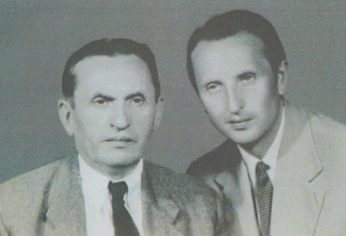 Image -- Dmytro Popovych with his son Mykola.