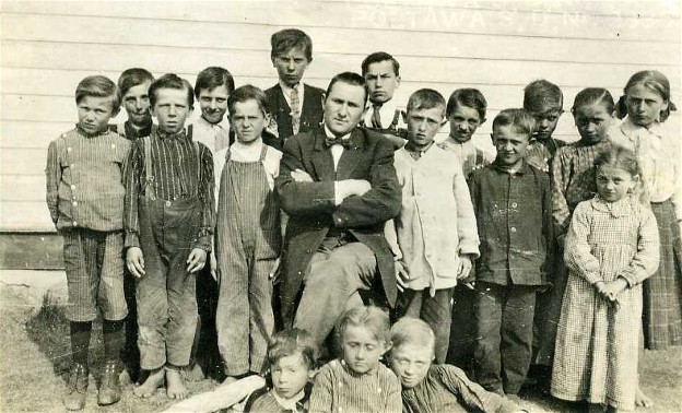 Image - A school teacher and his pupils in Poltawa School district in Cudworth, Saskatchewan (photo, courtesy of the Ukrainian Museum of Canada, Saskatoon Branch).
