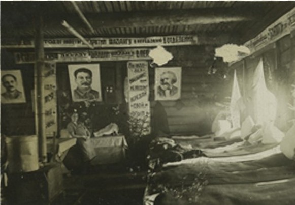 Image - An interior of a barrack in a Soviet labor camp.