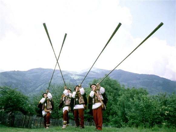 Image -- Hutsuls playing trembitas.