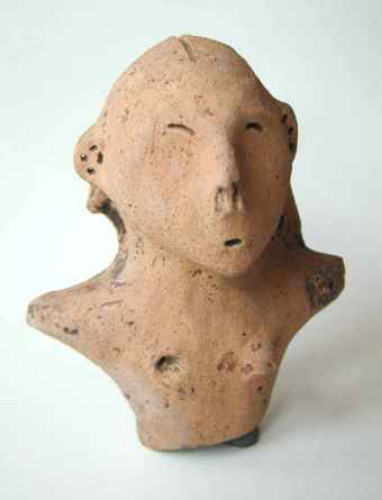Image - A Trypilian culture figurine torso.