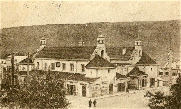 Image -- Town hall in Zalishchyky on an old postcard (early 20th century).